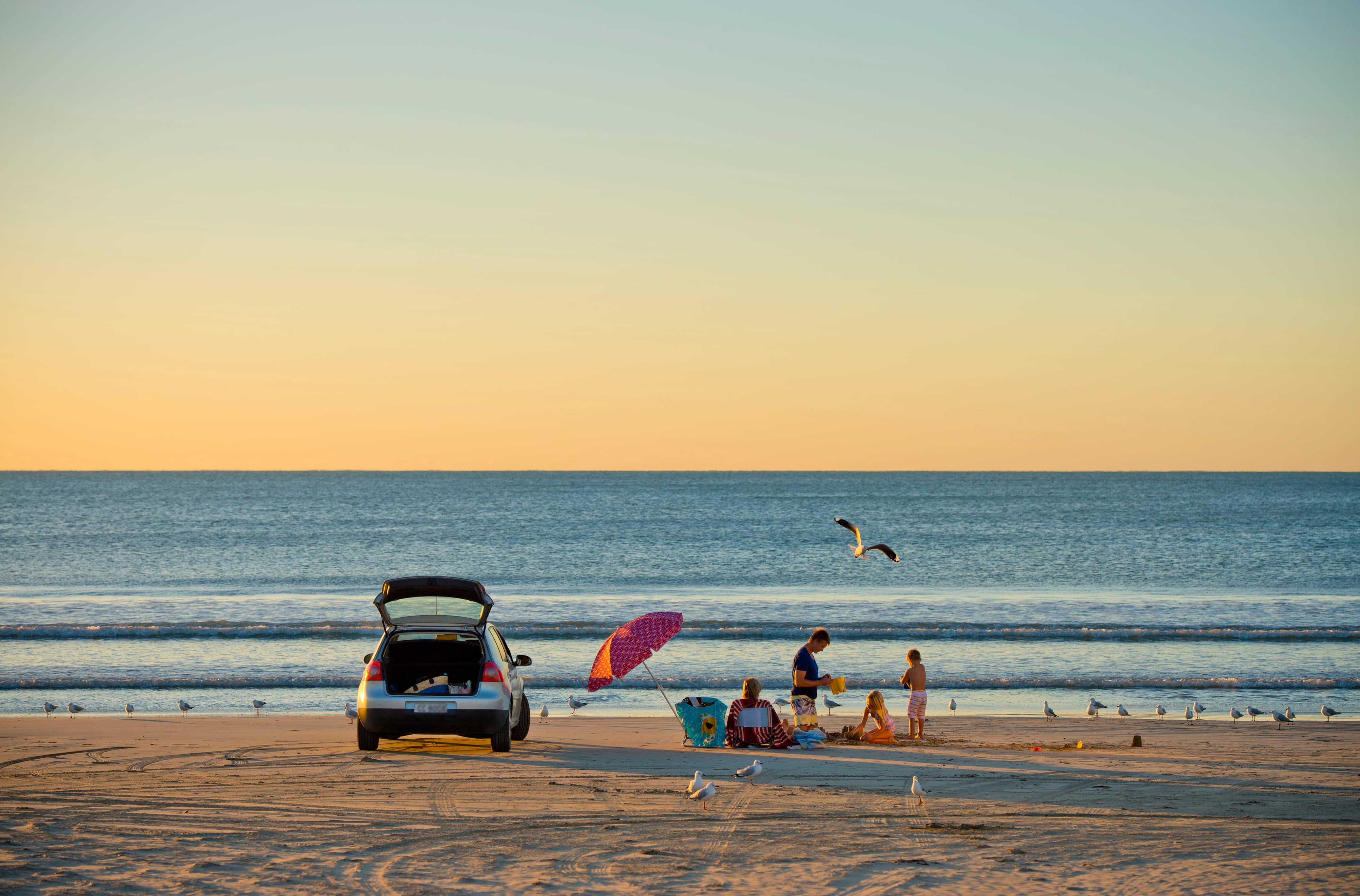 Family having a picnic on Long Beach, Robe, South Australia