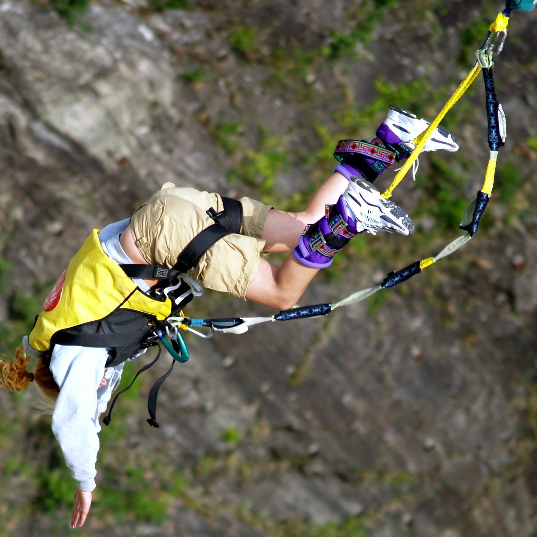 Woman bungee jumping