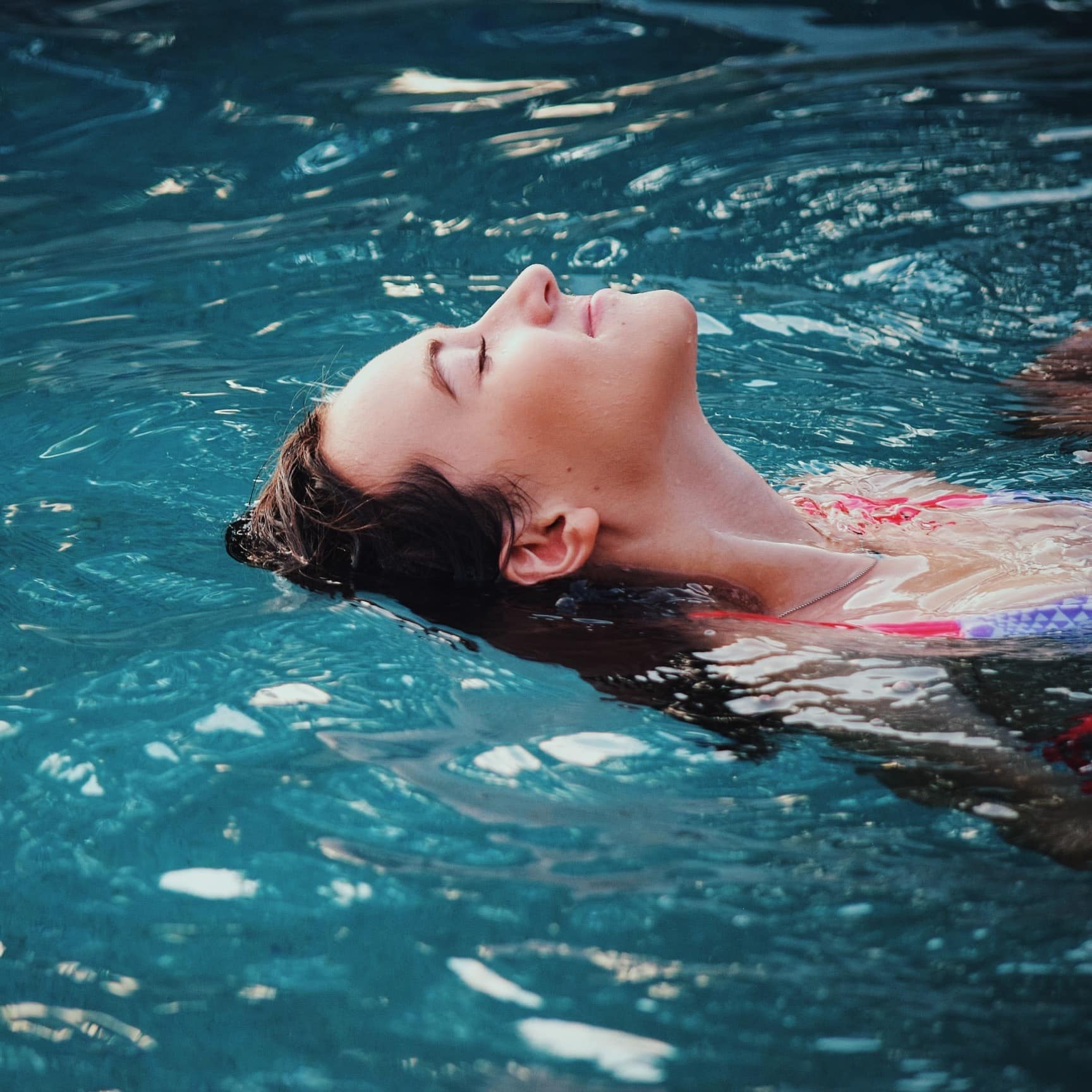 Woman floating in the water
