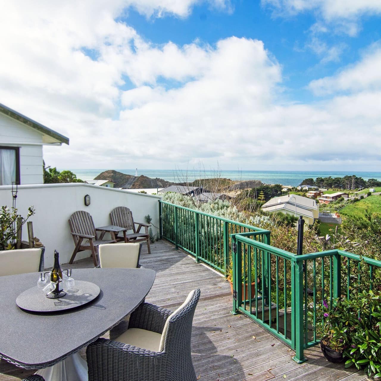 View from a beach house at Castlepoint beach with the neighbourhood and ocean in the distance