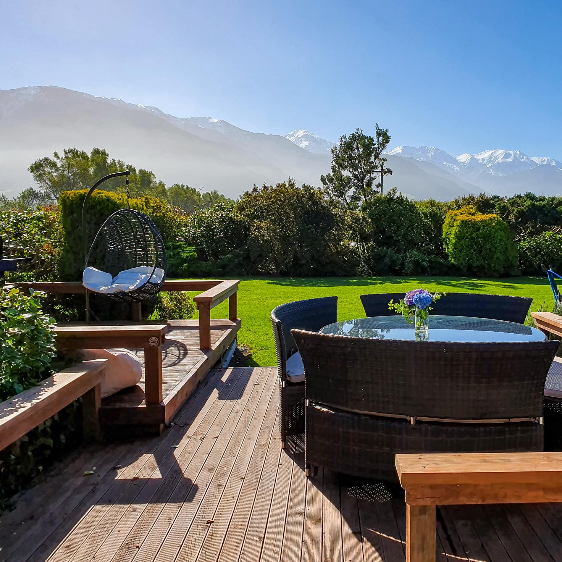 patio of a house in new zealand with beautiful mountain vistas