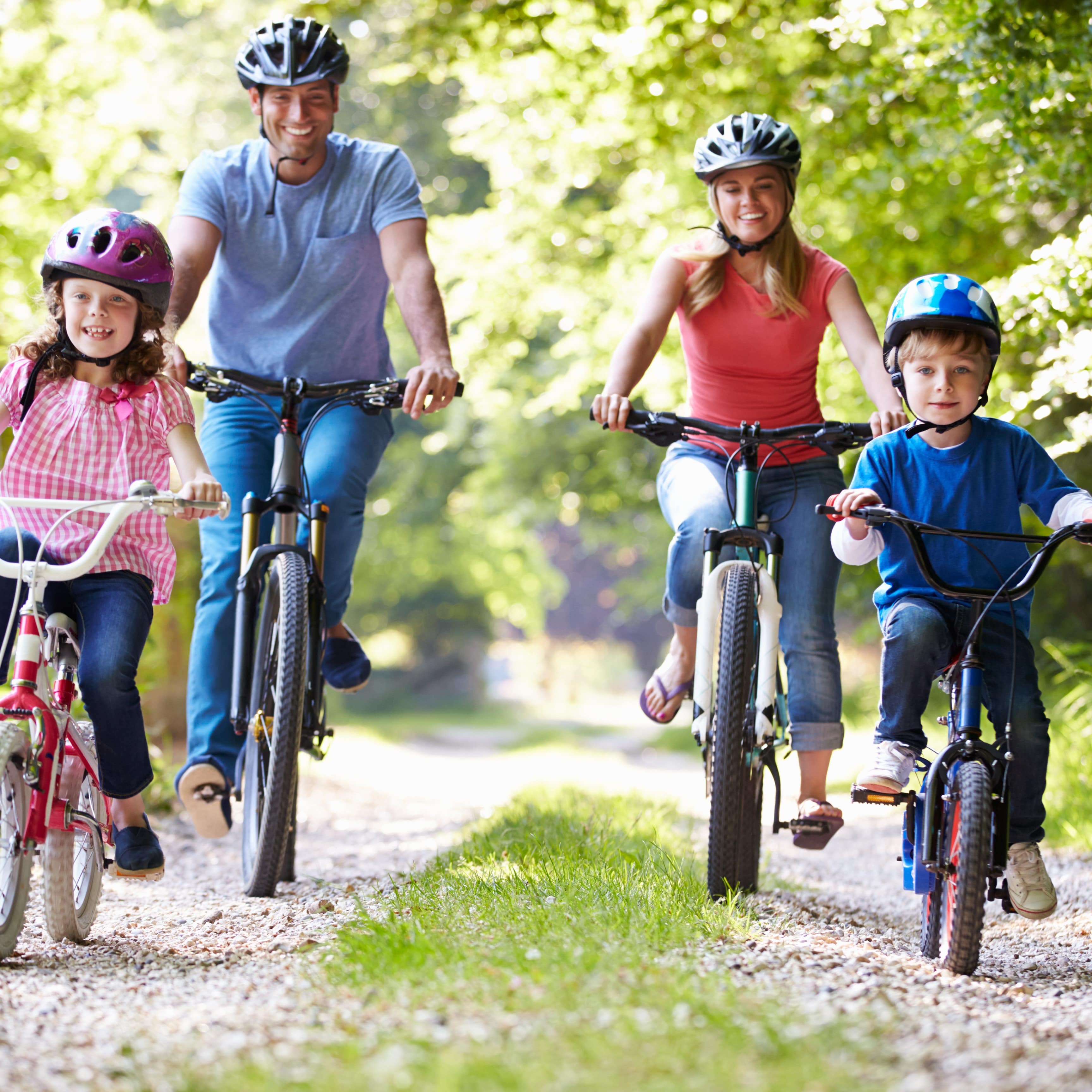 Family bike ride through countryside