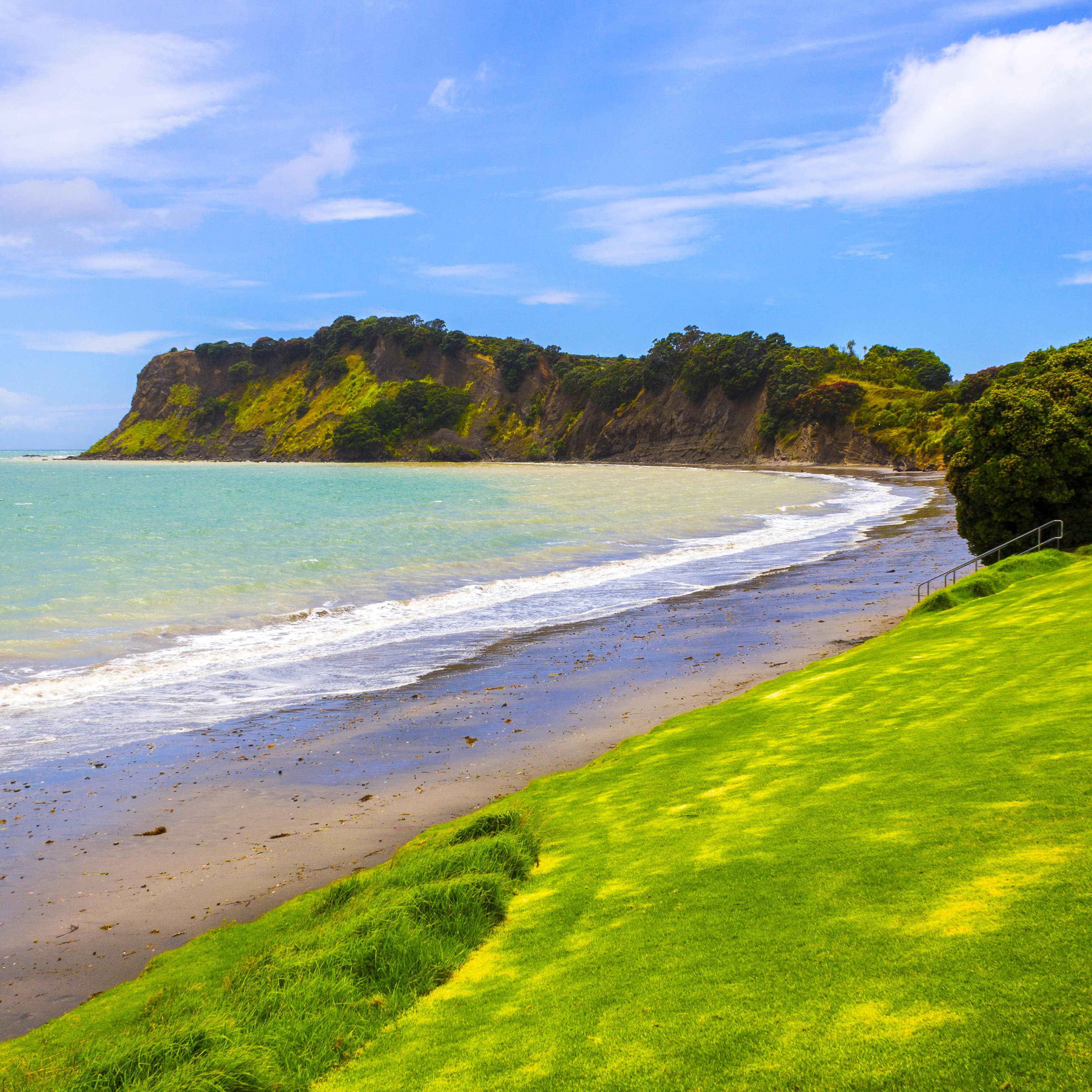 Panoramic view of the clear blue bay in Whangaparoa