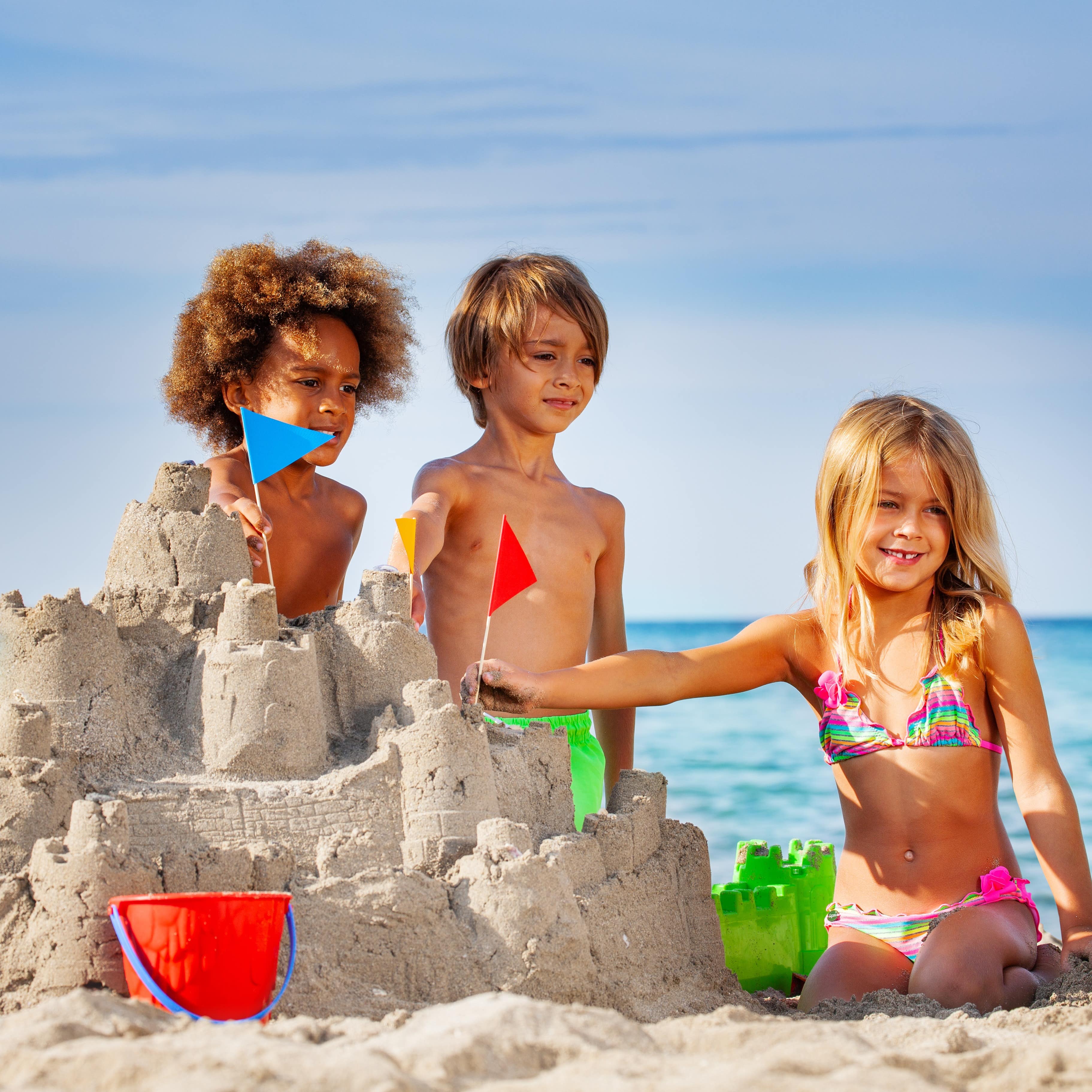 Kids building a sandcastle