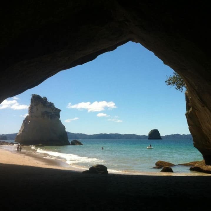 Rock formations sticking out of the ocean.