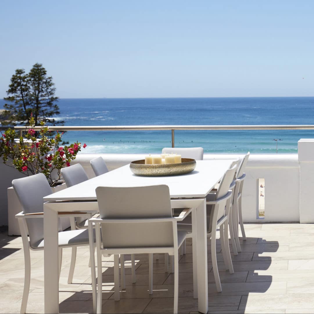 Chic Bondi Beach apartment with stone terrace with outdoor dining area ad magnificent view of azure waters