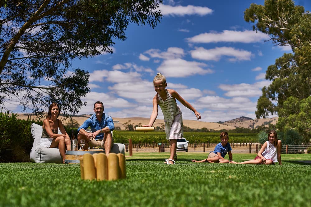 Family playing outdoor game Barossa Valley winery South Australia