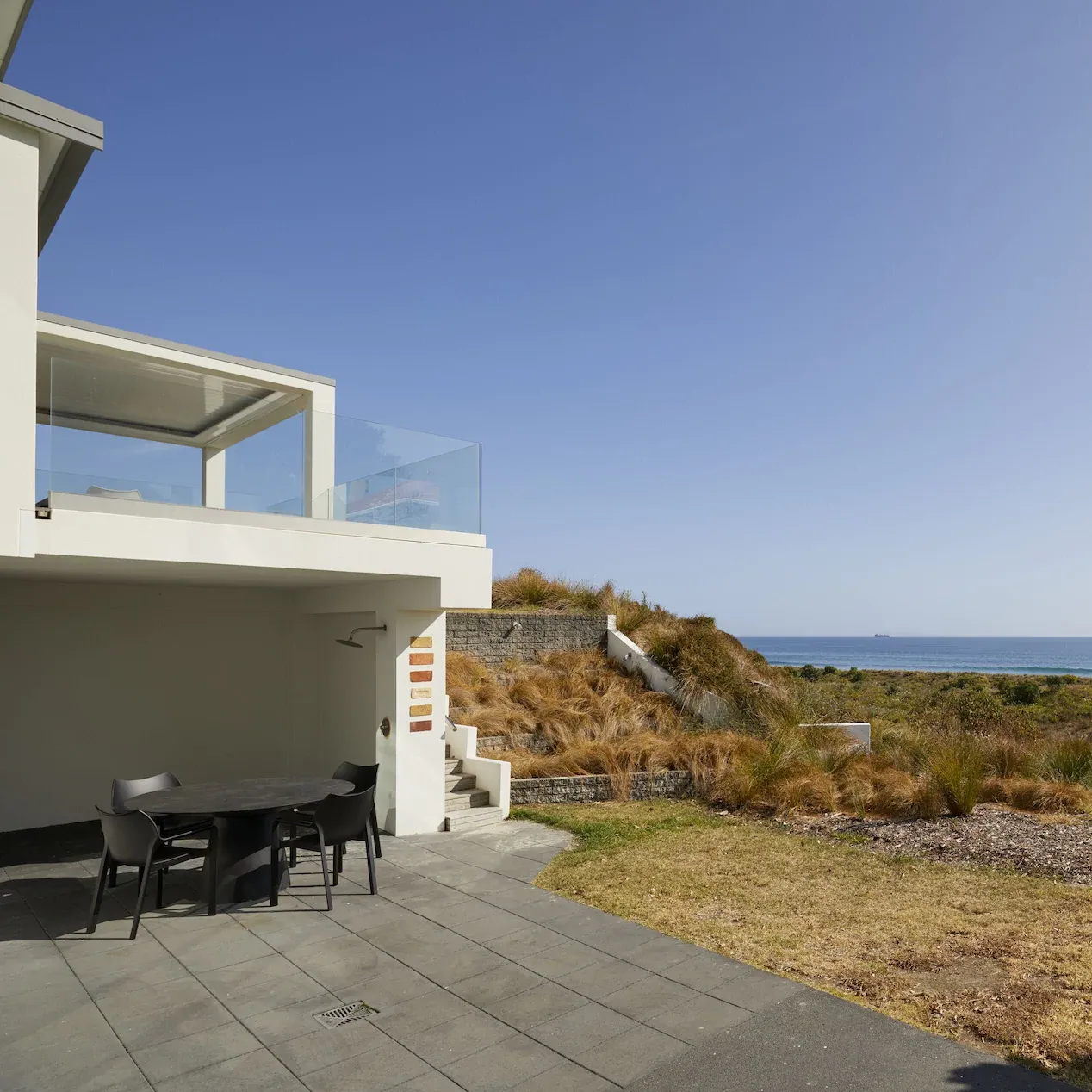 Backyard area of beachfront bach